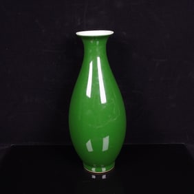A GREEN-GLAZED VASE