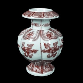 A UNDERGLAZED RED POMEGRANATE-SHAPED VASE