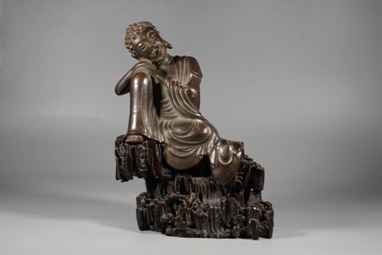 A BRONZE 'SEATED SAKYAMUNI' STATUE