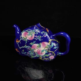 A BLUE-GROUND FAMILLE ROSE 'BAT AND SHOU' TEAPOT