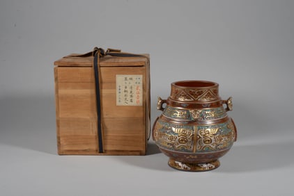 A BRONZE-EFFECT GLAZE 'TAOTIE' JAR