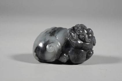 A BLUE AND WHITE JADE 'AUSPICIOUS BEAST'