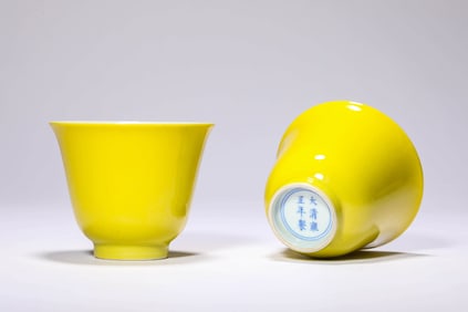 A PAIR OF LEMON-YELLOW-GROUND CUPS