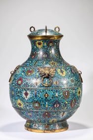 A CLOISONNé ENAMEL 'INTERLOCKING LOTUS' COVERED JAR