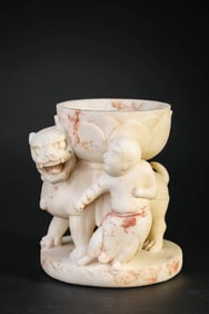A WHITE MARBLE LAMP STAND