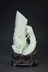 A JADE 'BAMBOO AND PHOENIX' BRUSHPOT