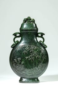 A JASPER RUYI-HANDLED COVERED VASE