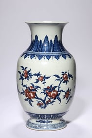 A BLUE AND WHITE WITH UNDERGLAZE-RED 'FU LU SHOU' VASE