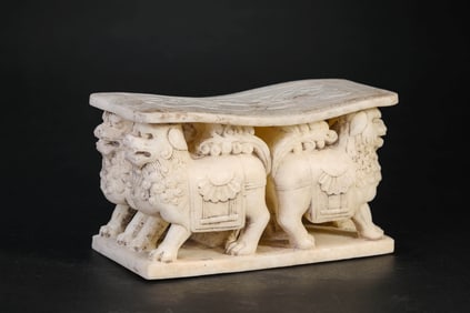 A WHITE MARBLE PILLOW