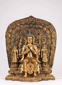 A GILT-BRONZE BUDDHIST FIGURE