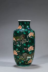 A BLACK-GLAZED 'FLORAL AND BEAST' LANTERN SHAPED VASE