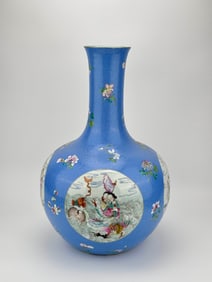A BLUE-GROUND FAMILLE ROSE 'FIGURE' GLOBULAR VASE
