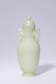 A JADE RUYI-HANDLED COVERED VASE