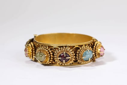 A GILT-SILVER GEM-SET BRACELET