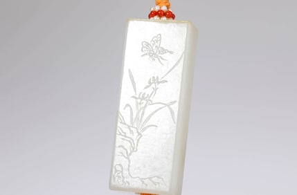 A JADE 'INSECT' PENDANT
