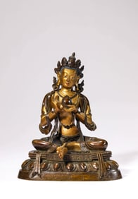 A GILT-BRONZE SURYA