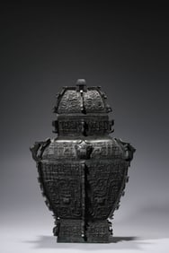 A BRONZE ARCHAIC-STYLE SQUARE YI