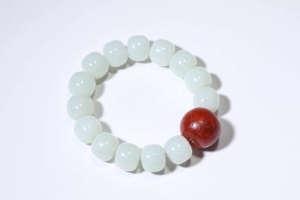 A NANHONG JADE BRACELET