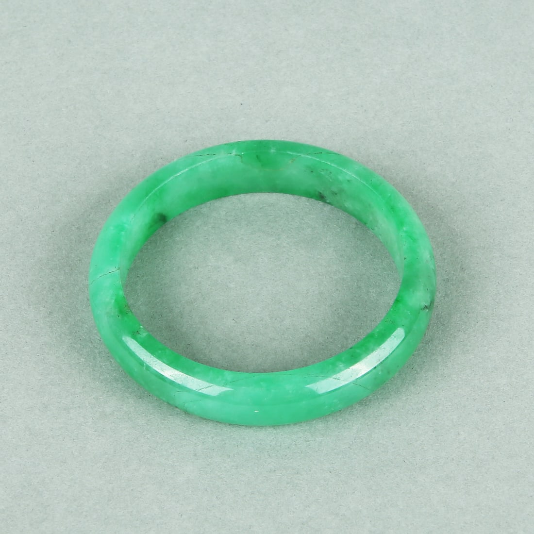 A BRACELET: A BRACELET Dimensions: Width: 5.3 cm (2.09 in.). All measurements are approximate. Any condition statement is given as a courtesy to a client, is only an opinion and should not be treated as a stateme