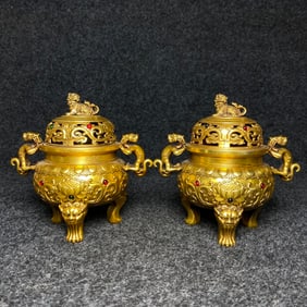 A GILT BRONZE 'FRAGRANT REED' ORNAMENT