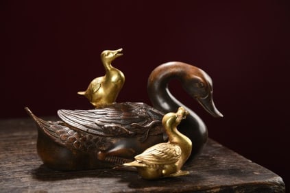 A 'FAMILY HARMONY' ORNAMENT