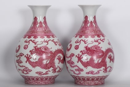 A PAIR OF RUBY-RED ENAMEL 'TWO DRAGONS CHASING BALL' YUHUCHUNPING