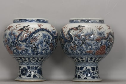A BLUE AND WHITE RELIEF 'CLOUD DRAGON' STEM JAR