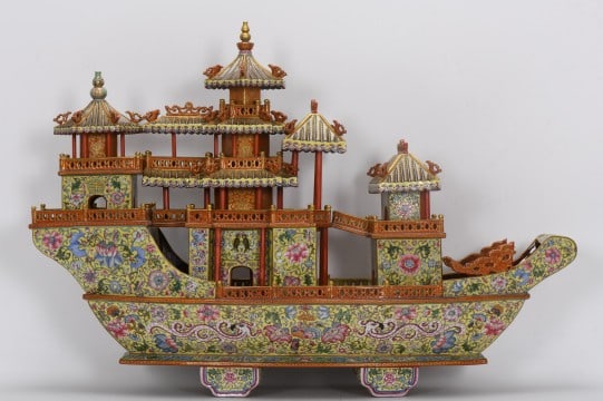 A YELLOW-GROUND ENAMEL WITH GILT SHIP MODEL: A YELLOW-GROUND ENAMEL WITH GILT SHIP MODEL Dimensions: Height: 48 cm (18.9 in.), Length: 70 cm (27.56 in.), Width: 24 cm (9.45 in.). All measurements are approximate. Any condition statement is given