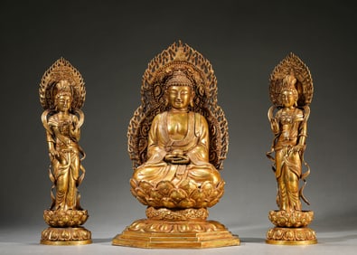 A GROUP OF GILT-BRONZE BUDDHIST FIGURES