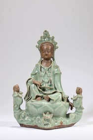 A LONGQUAN GUANYIN WITH CHILD