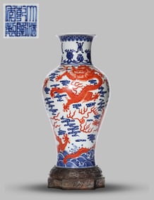 A BLUE AND WHITE AND UNDERGLAZE-RED 'DRAGON IN WAVES AND CLOUDS' VASE