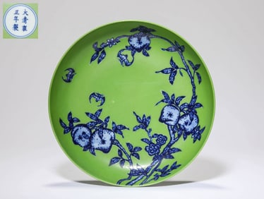 A GREEN-GLAZED BLUE AND WHITE 'SHOU' DISH