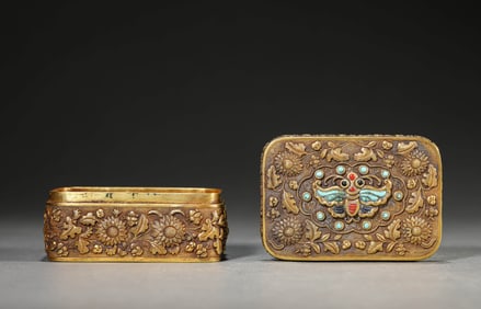 A SILVER AND GEM-SET COVERED BOX