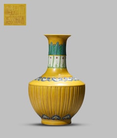 A YELLOW-GLAZED CARVED MELON-FORM VASE