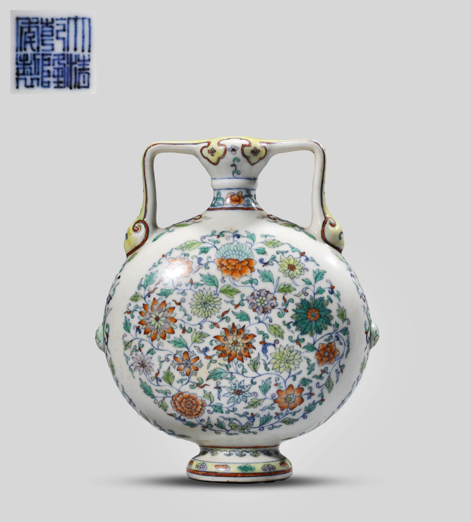 A DOUCAI MOONFLASK: A DOUCAI MOONFLASK Dimensions: Length 15.7 cm (6.18 in.) x Width 8.8 cm (3.46 in.) x Height 19 cm (7.48 in.). All measurements are approximate. Any condition statement is given as a courtesy to a clie