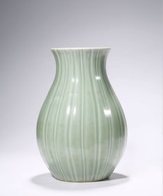 A PALE CELADON GLAZED MELON-FORM VASE