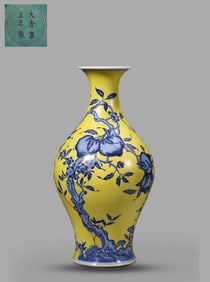 A YELLOW-GROUND BLUE AND WHITE 'BAT AND SHOU' VASE