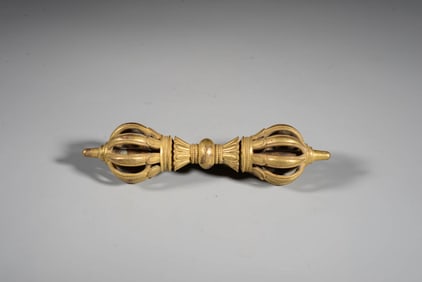 A GILT-BRONZE VAJRA