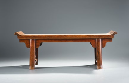 A HUANGHUALI TABLE WITH MARBLE-INLAID UPTURNED ENDS
