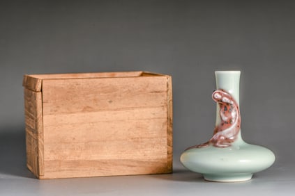 A PALE CELADON-GLAZED 'DRAGONS' SMALL VASE