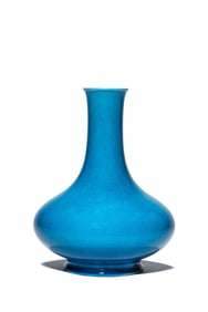 A PEACOCK BLUE GLAZED VASE