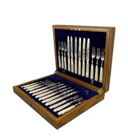 A SET OF SILVER-PLATED MOTHER-OF-PEARL CUTLERY