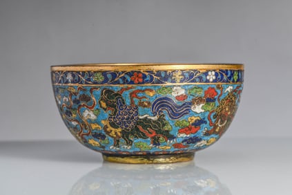 A CLOISONNé 'LION PLAYING WITH BALL' BOWL