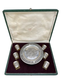 A SET OF WHITE WINE CUPS WITH DRAGON PATTERNS