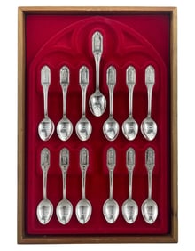 A SET OF SILVER SPOONS OF "JESUS AND THE TWELVE APOSTLES"