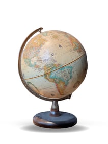 A PAPER SPHERE GLOBE WITH A WOODEN BASE