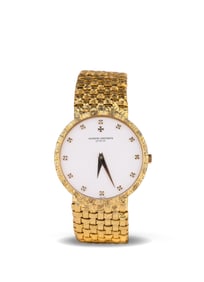 VACHERON CONSTANTIN 18K GOLD MECHANICAL WATCH INLAID WITH DIAMONDS