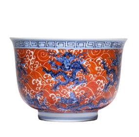 A BLUE AND WHITE WITH IRON-RED 'SEA AND DRAGONS' BOWL