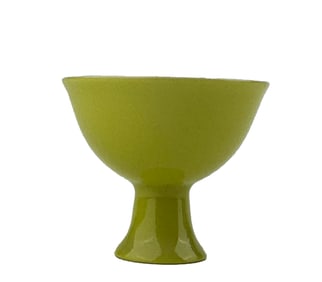 A LEMON-YELLOW GLAZED STEM CUP