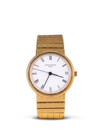 PATEK PHILIPPE 18K GOLD AUTOMATIC MECHANICAL WATCH